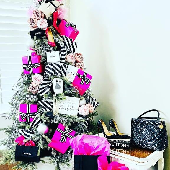 Fashionista tree with hot pink boxes and designer handbags